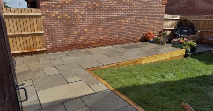 Sloped Garden Transformed With Sandstone Patio and Sleepers, Ledbury