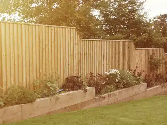 feather edged fencing and sleeper bed